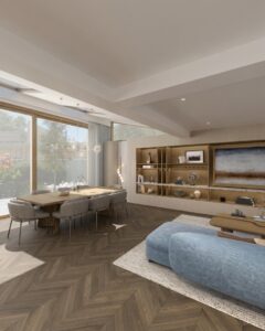 Open-plan living and dining room design with large windows, wooden dining table, blue sofa and herringbone flooring.
